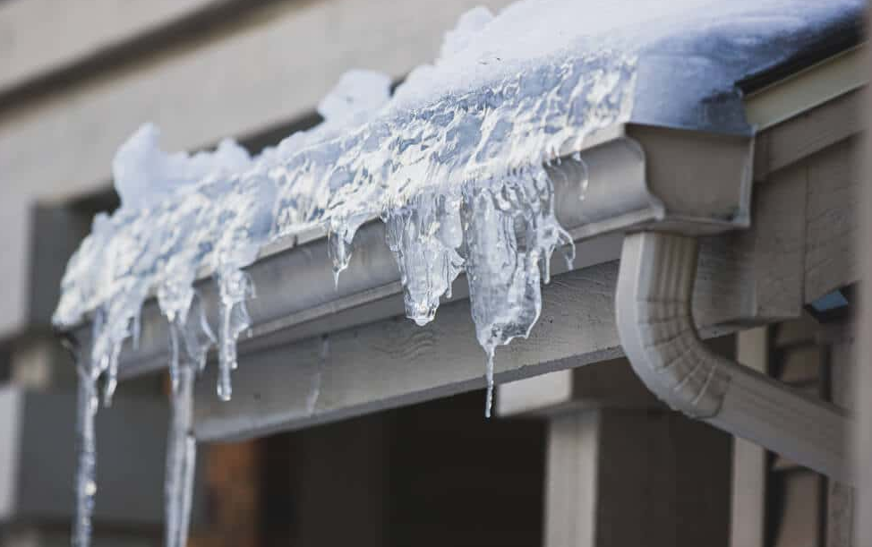 Frozen Gutter and Downspout: Should I Call a Roofer or a Plumber?